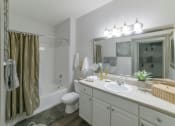 Thumbnail 12 of 27 - a bathroom with a sink and a shower and a toilet at The Shallowford, Chattanooga, TN, 37421