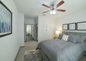 Thumbnail 7 of 27 - a bedroom with a bed and a ceiling fan at The Shallowford, Chattanooga, TN, 37421