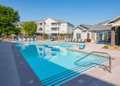 Thumbnail 15 of 27 - our apartments have a resort style pool with lounge chairs at The Shallowford, Chattanooga, TN, 37421