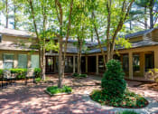 Thumbnail 18 of 29 - the front of a house with trees and a courtyard at The Summit Apartments, Tennessee