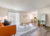 Thumbnail 5 of 14 - a living room with a couch and a mirror at The Waters at Chenal, Little Rock, 72211