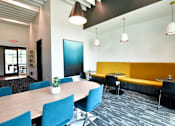 Thumbnail 23 of 29 - A coworking room with ample seating space and a beautiful design