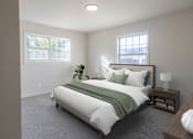 Thumbnail 6 of 19 - a bedroom with a bed and two windows