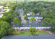 Thumbnail 18 of 18 - Bird's eye view of a residential area with houses and trees at The Garden District Apartments, Germantown