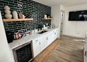 Thumbnail 22 of 24 - Office Kitchen at The Garden District Apartments, Germantown  