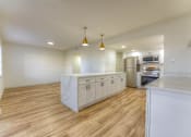 Thumbnail 4 of 24 - Open kitchen at The Garden District Apartments, Tennessee  
