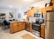 Thumbnail 2 of 25 - Spacious kitchen with stainless steel appliances at Grand Island Apartments in Memphis TN 38103