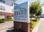 Thumbnail 25 of 25 - Front Entrance Monument Sign at Grand Island Apartments in Memphis TN 38103