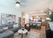 Thumbnail 2 of 28 - Living Room With Kitchen View at Grays Creek Apartments, Cordova, TN