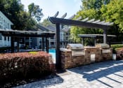 Thumbnail 17 of 36 - Grills at Pool Area at Grove Point, Norcross, 30093