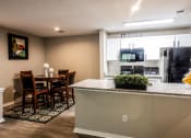 Thumbnail 4 of 36 - Kitchen and Dining Room at Grove Point, Norcross, GA