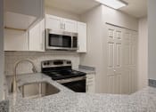 Thumbnail 11 of 22 - Stainless Steel Sink With Faucet In Kitchen at Hampton Woods, Shawnee, KS