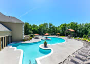 Thumbnail 21 of 22 - Refreshing Swimming Pool with Relaxing Poolside Lounge Chairs at Hampton Woods, Kansas, 66217