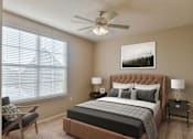 Thumbnail 8 of 18 - Bedroom with large window and ceiling fan at Harbor Island Apartments, Memphis, Tennessee
