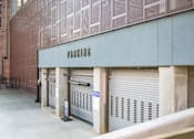 Thumbnail 33 of 37 - A parking garage with a sign that says at Harbor Side at Conwood Flats Apartments, Memphis, TN, 38107