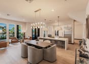 Thumbnail 12 of 18 - Clubhouse gathering and kitchen area at Harrison Apartments, Sarasota, FL