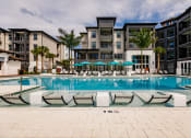 Thumbnail 8 of 18 - Resort style pool at Harrison Apartments, Sarasota