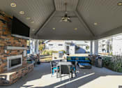 Thumbnail 24 of 31 - Patio with Firepit at Henley at Mirror Lake in Villa Rica, GA