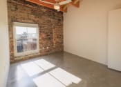 Thumbnail 6 of 17 - Interior Den with Window at 99 Front, Memphis, TN