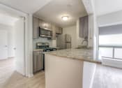 Thumbnail 17 of 38 - Kitchen at Iris Luxury Apartments, Memphis, TN  