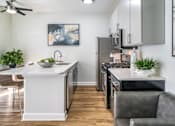 Thumbnail 6 of 38 - Model Kitchen at Iris Luxury Apartments, Memphis, 38105  