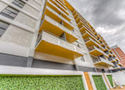 Thumbnail 23 of 38 - Exterior Tower at Iris Luxury Apartments, Tennessee, 38105