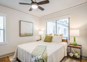 Thumbnail 24 of 28 - a bed with a window behind it at Kiwi Goji Apartments, Tennessee, 38111