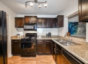 Thumbnail 1 of 16 - Model kitchen at Lakeside at Arbor Place, Georgia, 30135