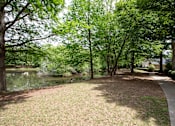 Thumbnail 33 of 38 - Park with a pond at Lakeside Villas Apartments, Hampton