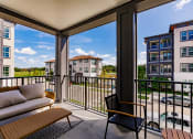 Thumbnail 7 of 18 - Large patio and balcony areas at Harrison Apartments, Florida, 34243