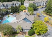 Thumbnail 12 of 28 - an aerial view of a house with a swimming pool