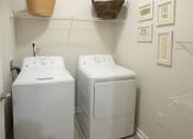 Thumbnail 9 of 28 - laundry room with washer and dryer