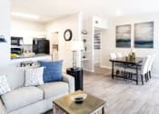 Thumbnail 6 of 24 - Model living room and dining room at Lincoln at Wolfchase, Cordova TN 38016