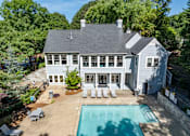 Thumbnail 15 of 29 - A large house with a pool in the backyard. at Manchester at Mansell, Roswell, 30076 