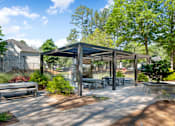 Thumbnail 21 of 29 - A park with a pavilion, benches, and trees. at Manchester at Mansell, Roswell 