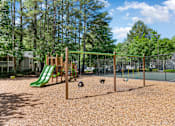 Thumbnail 26 of 29 - A playground with a green slide and swings. at Manchester at Mansell, Roswell Georgia 