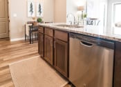 Thumbnail 3 of 29 - Kitchen bar with a sink and a dishwasher at Meridian Park in Collierville, TN 38017