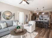 Thumbnail 5 of 29 - Living room and kitchen at Meridian Park in Collierville, TN 38017