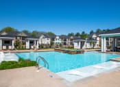 Thumbnail 11 of 29 - Pool and sundeck at Meridian Park in Collierville, TN 38017