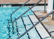 Thumbnail 12 of 29 - a swimming pool with stainless steel handrails at Meridian Park in Collierville, TN 38017