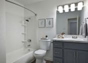 Thumbnail 6 of 24 - Bathroom with mirror at Normandy Woods in Riviera East, Houston, TX, 77015