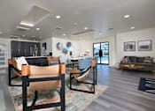 Thumbnail 12 of 24 - Resident Clubhouse Lounge at Normandy Woods in Riviera East, Houston, TX, 77015