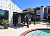 Thumbnail 17 of 24 - Pool Area at Normandy Woods in Riviera East, Houston, TX, 77015