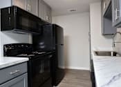 Thumbnail 3 of 24 - Kitchen at Normandy Woods in Riviera East, Houston, TX, 77015