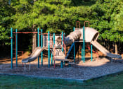Thumbnail 18 of 25 - Playground area at One Rocky Ridge Apartment, Georgia