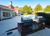 Thumbnail 14 of 25 - Gas Grills at Pool at One Rocky Ridge Apartment, Georgia