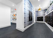Thumbnail 24 of 25 - A white wall with a blue brick pattern on the side and a white wall with a black brick pattern on the other side.
