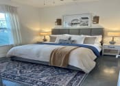 Thumbnail 3 of 21 - a bedroom with a bed and a window