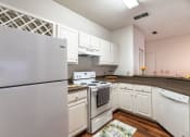 Thumbnail 13 of 39 - Kitchen with cabinets and appliances at Paradise Island, Florida, 32256