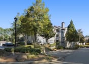 Thumbnail 26 of 31 - Building exterior and landscaping at Park Summit Apartments in Decatur, GA 30033